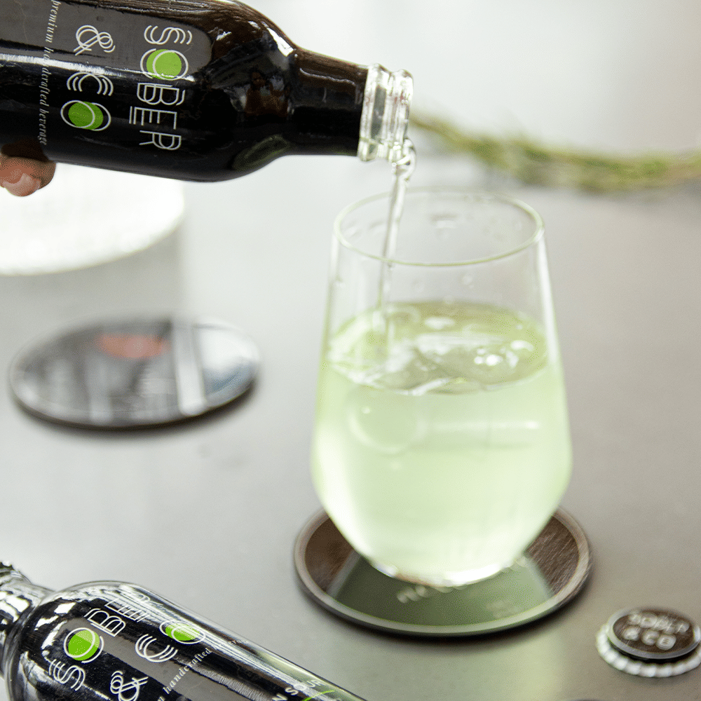 Tableware,Drinkware,Liquid,Bottle,Product,Solution,Water,Lime juice,Cocktail,Gimlet