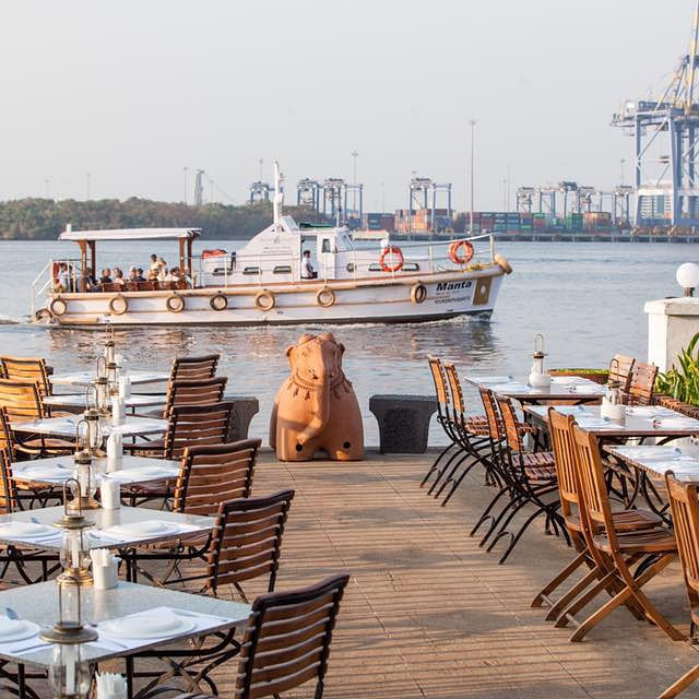 Water,Sky,Furniture,Boat,Watercraft,Table,Chair,Wood,Outdoor furniture,Naval architecture