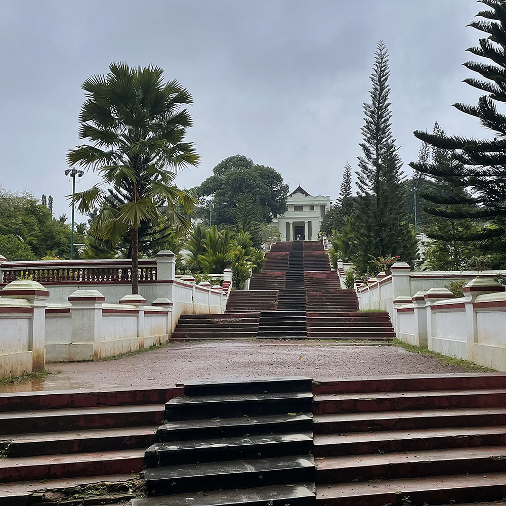 Sky,Plant,Stairs,Tree,Cloud,Temple,Wood,Symmetry,Roof,Historic site