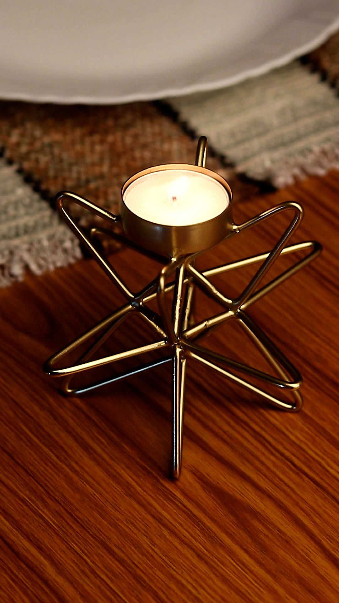 Table,Wood,Amber,Gold,Circle,Ornament,Metal,Fashion accessory,Hardwood,Symmetry