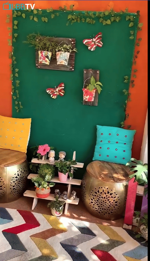 Property,Decoration,Green,Purple,Textile,Interior design,Orange,Lighting,Yellow,Building