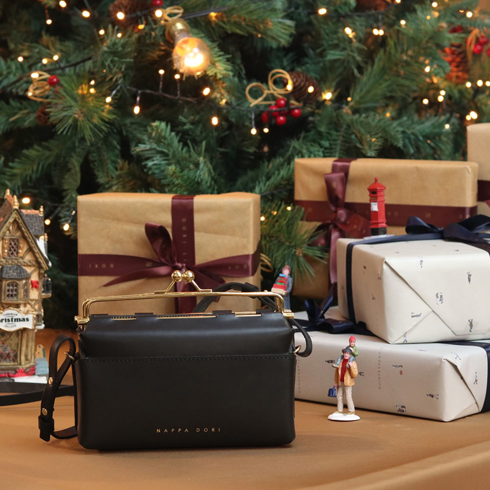 Christmas tree,Christmas ornament,Plant,Interior design,Decoration,Tree,Holiday ornament,Ornament,Christmas decoration,Living room