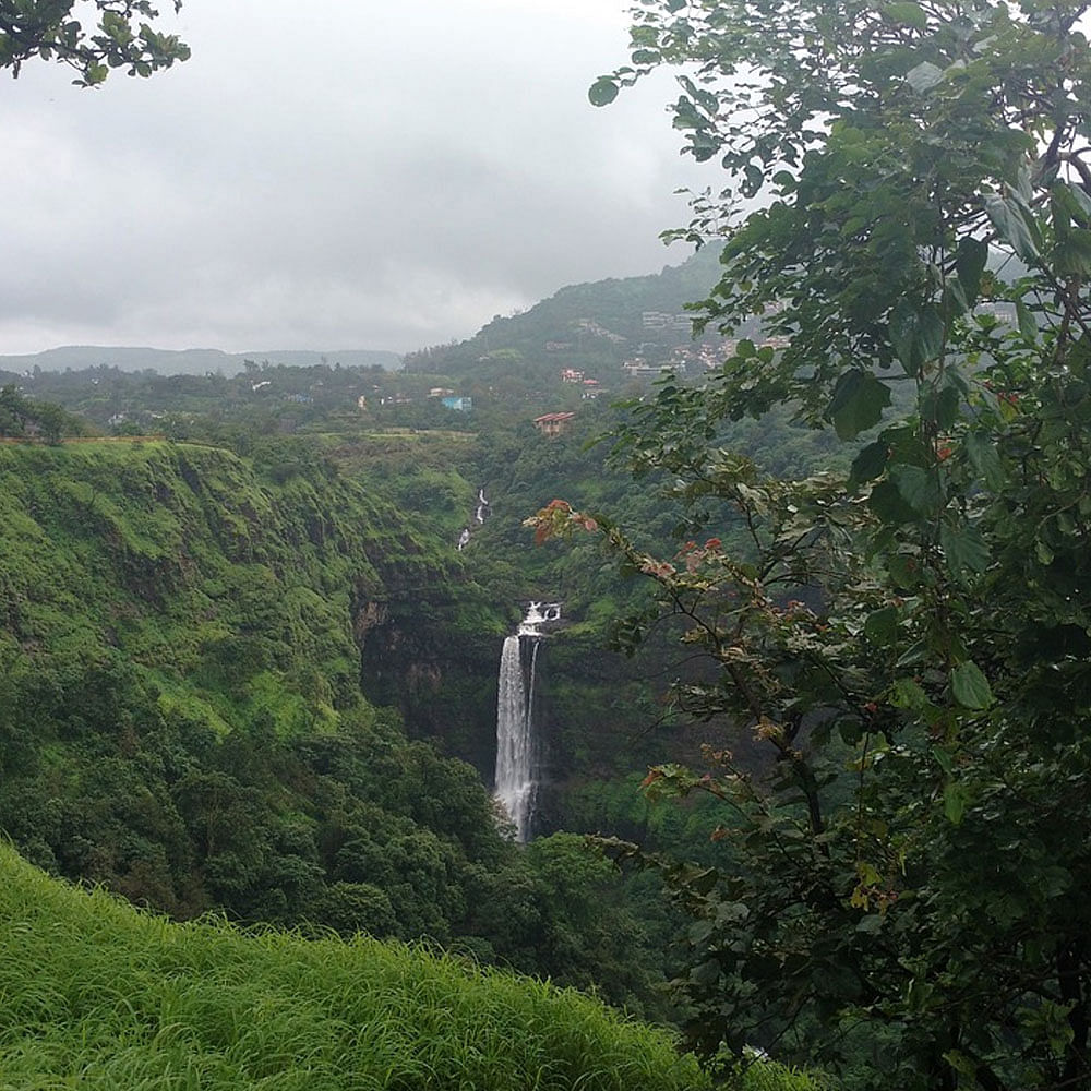 Cloud,Plant community,Sky,Ecoregion,Plant,Natural landscape,Mountain,Water,Vegetation,Waterfall