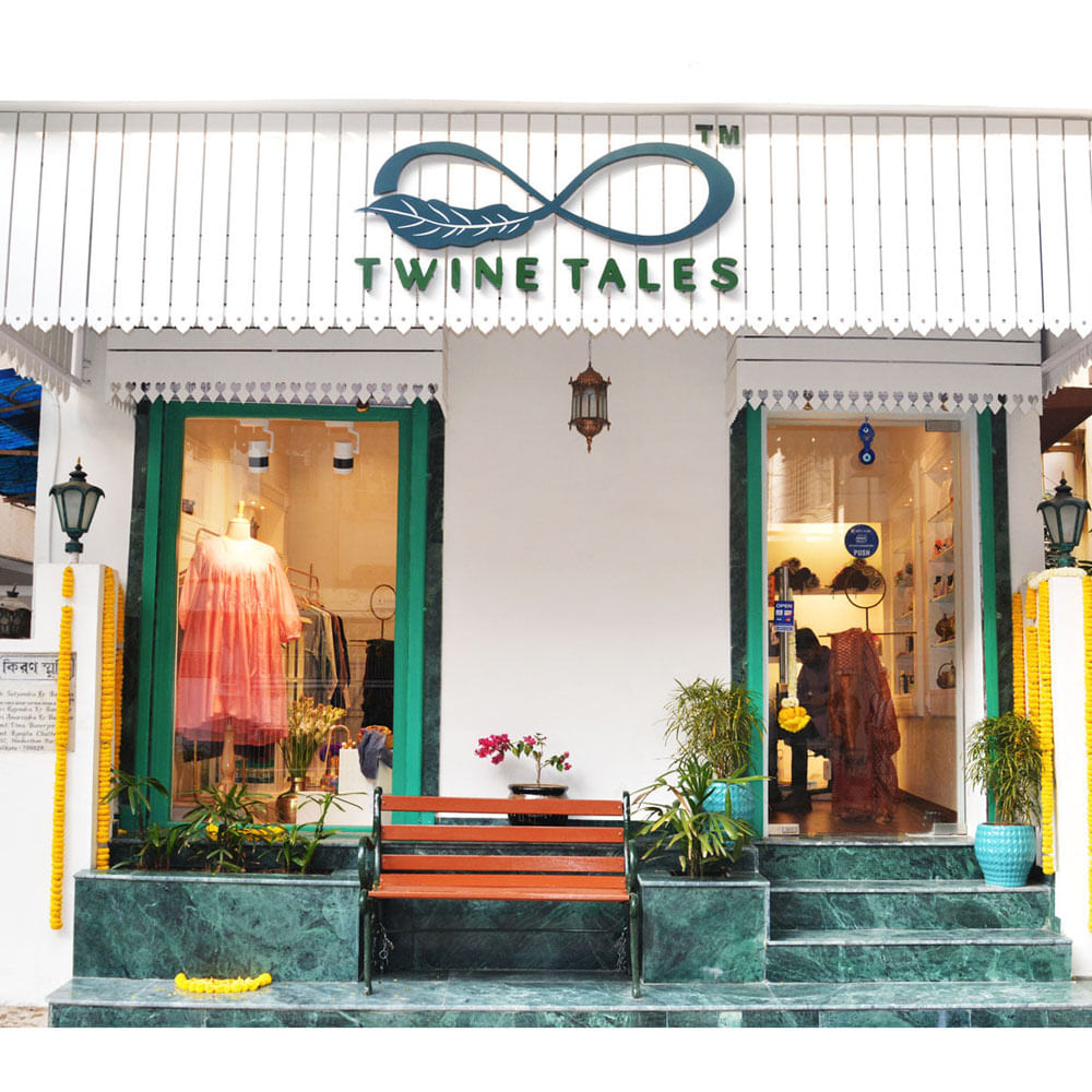 Plant,Green,Font,Facade,Tints and shades,Shade,Decoration,Door,Leisure,Temple