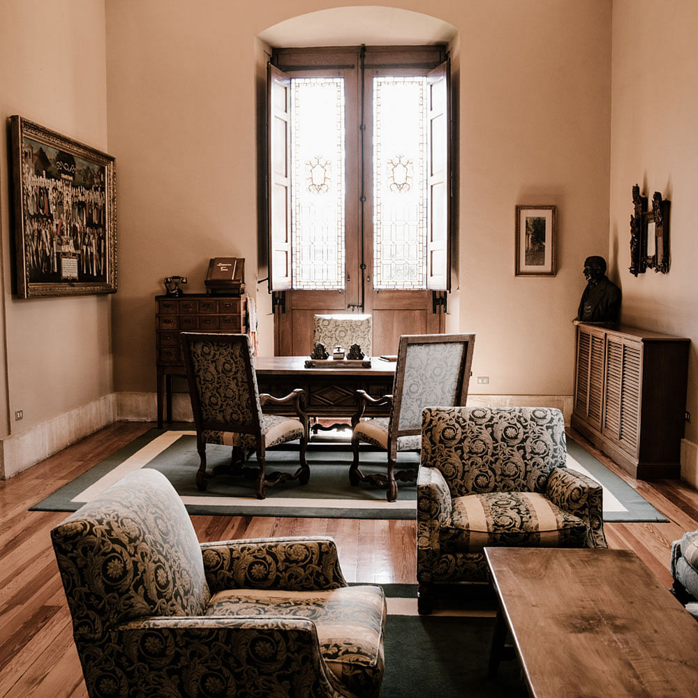 Table,Picture frame,Couch,Furniture,Wood,Building,Interior design,Plant,Window,Living room