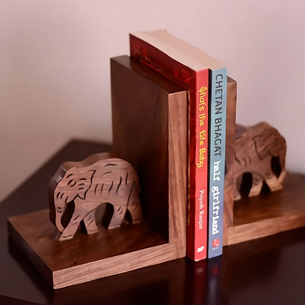 Wood,Mammal,Art,Font,Shelving,Bookend,Publication,Hardwood,Flooring,Wood stain