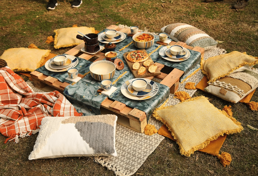 Food,Textile,Tableware,Tablecloth,Dishware,Cuisine,Grass,Event,Wood,Linens