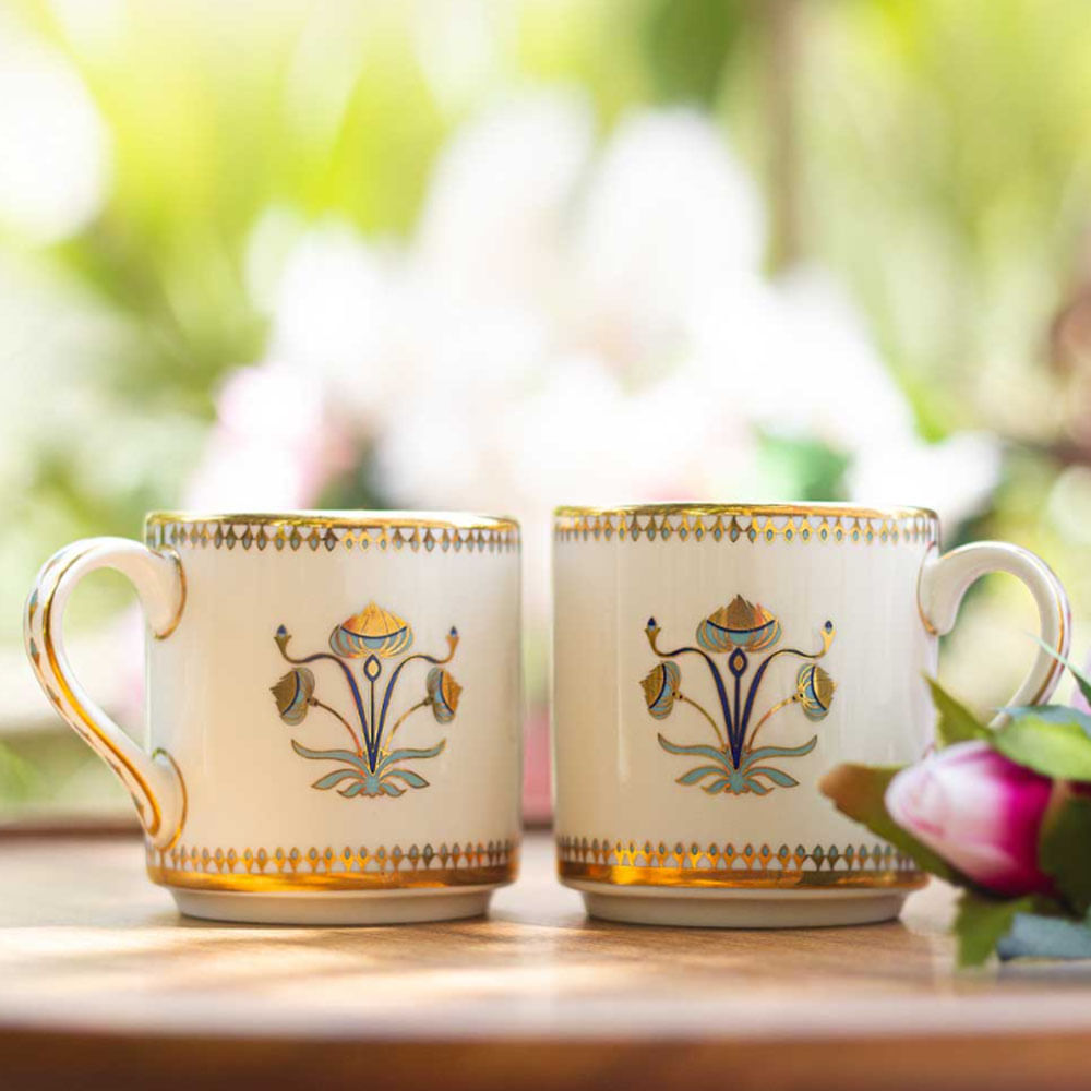 Tableware,Drinkware,Dishware,Cup,Teacup,Serveware,Plant,Porcelain,Coffee cup,Font