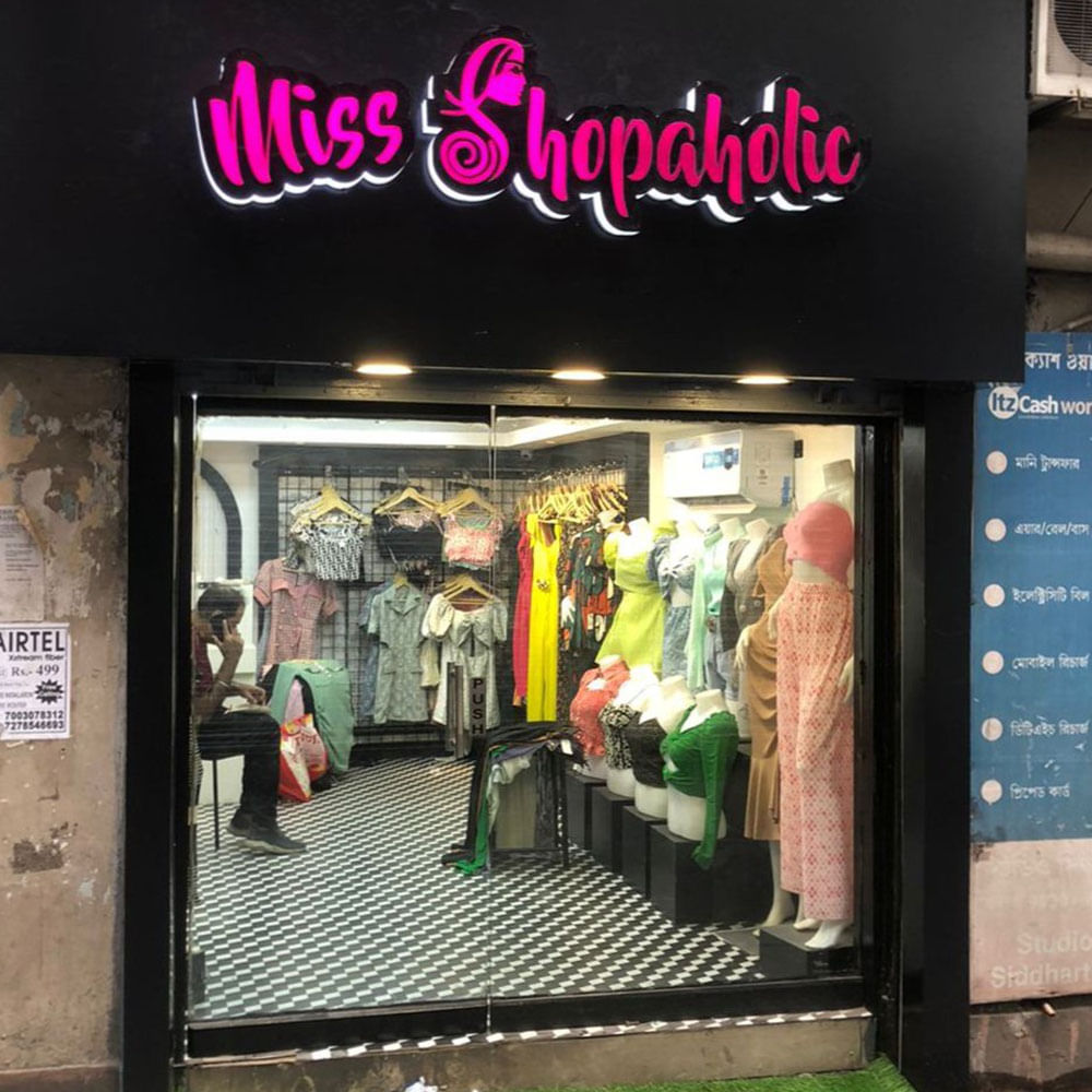 Retail,Fixture,Signage,Facade,Advertising,Display window,Font,Electronic signage,Trade,Display device