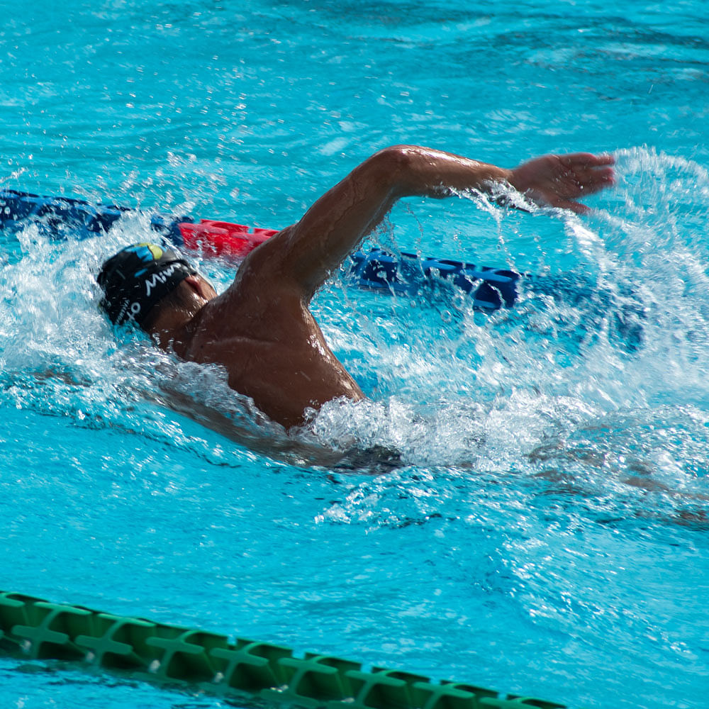 Water,Vertebrate,Swimmer,Swimming pool,Medley swimming,Headgear,Leisure,Sports,Competition event,Recreation