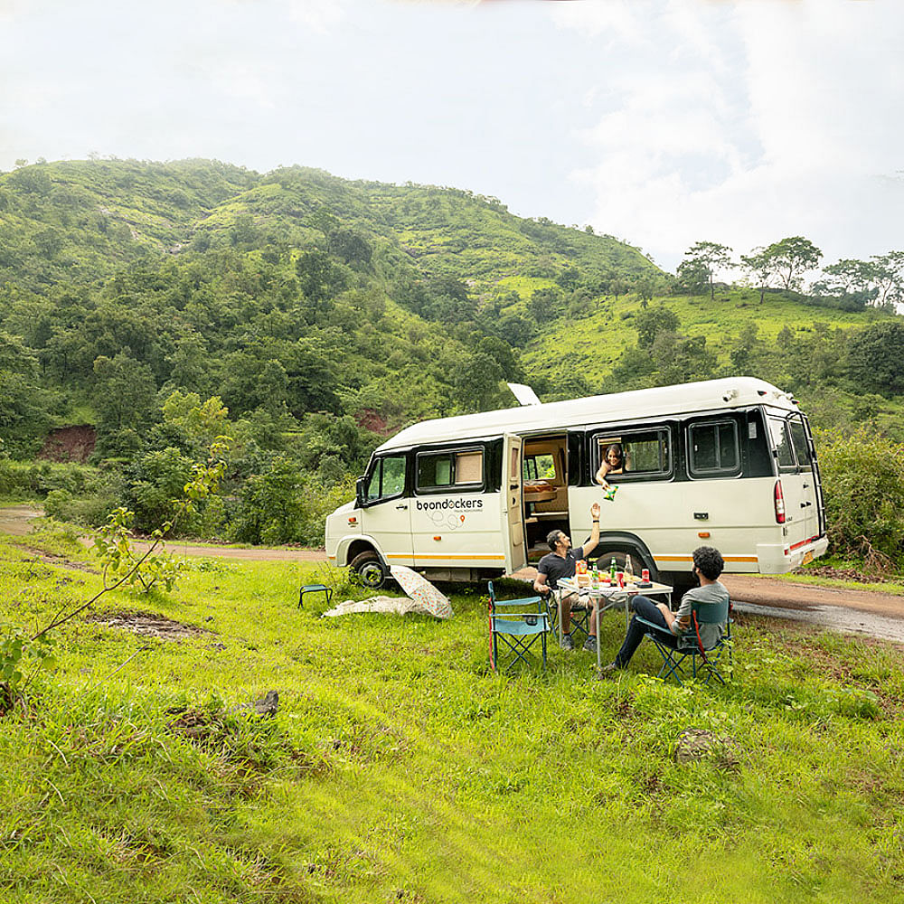 Cloud,Plant,Sky,Bus,Vehicle,Motor vehicle,Car,Tree,Mountain,Grass