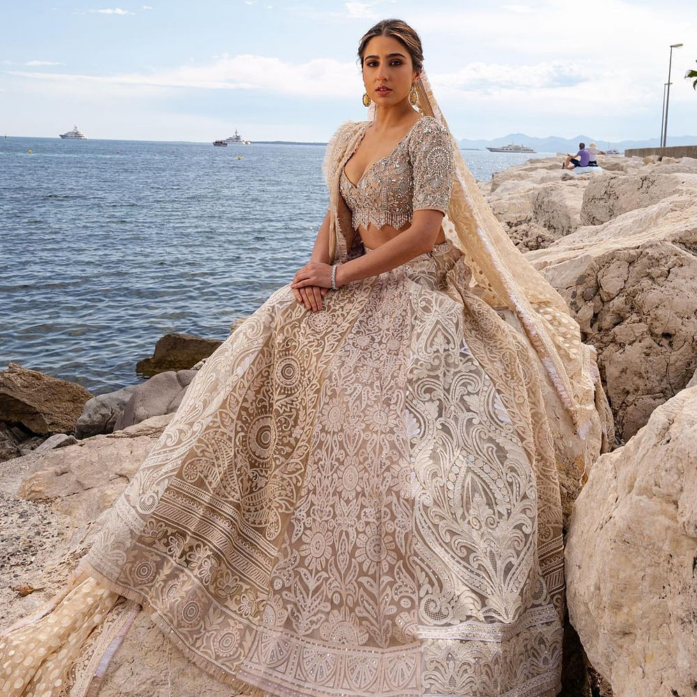 Sky,Water,Cloud,Wedding dress,Dress,Bride,Flash photography,Wood,Gown,Happy