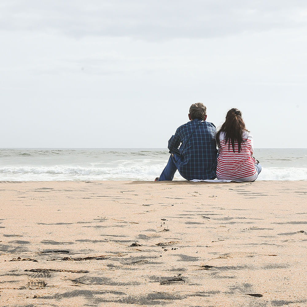 Water,Sky,Cloud,People on beach,People in nature,Beach,Gesture,Happy,Coastal and oceanic landforms,Travel