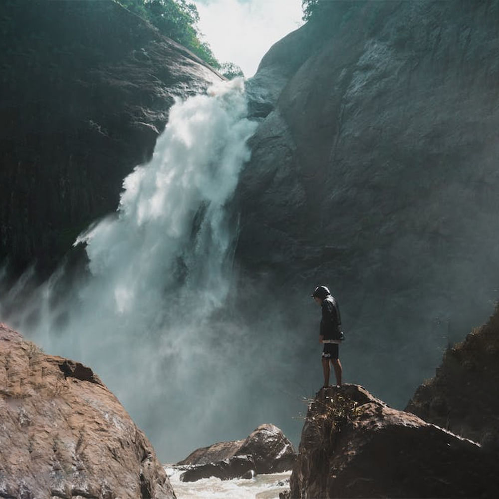 Water,Mountain,Body of water,Highland,Watercourse,Waterfall,Terrain,Mountainous landforms,Formation,Geological phenomenon