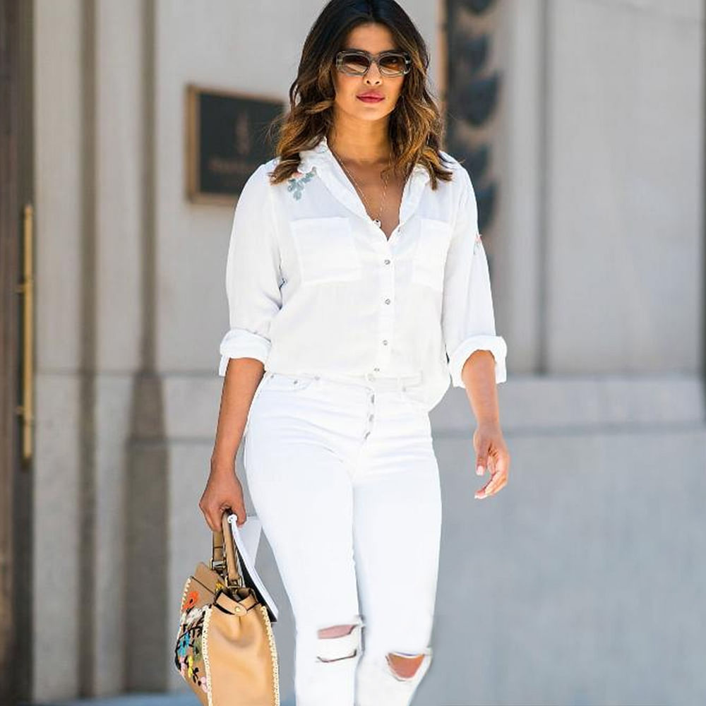 Hairstyle,Shoulder,Eyewear,Neck,Sleeve,Waist,Orange,Sunglasses,Thigh,Collar