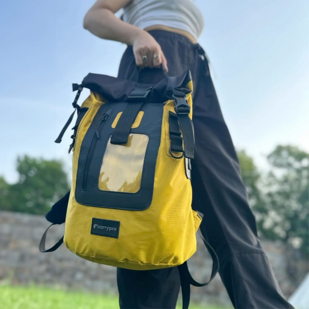 Sky,Luggage and bags,Bag,Travel,Plant,Backpack,Sleeve,Tree,Grass,Font