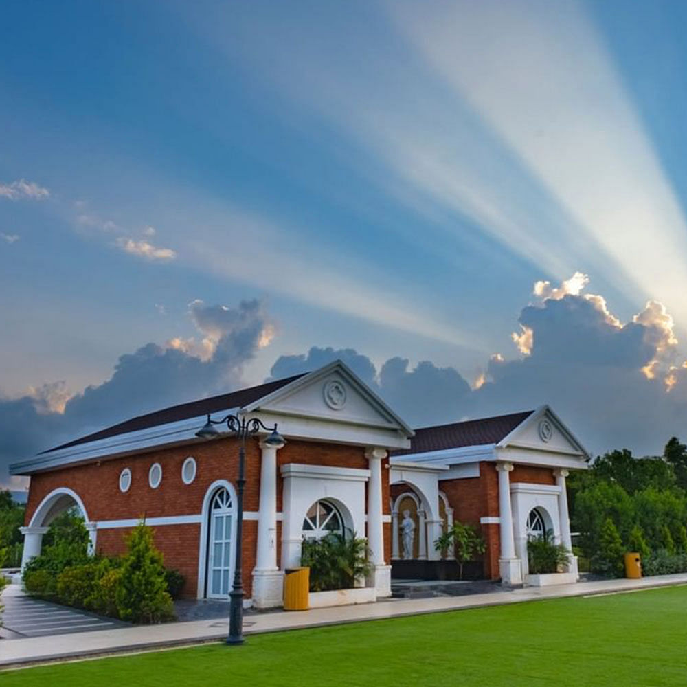 Cloud,Plant,Sky,Building,Window,Door,Land lot,Tree,Grass,Landscape