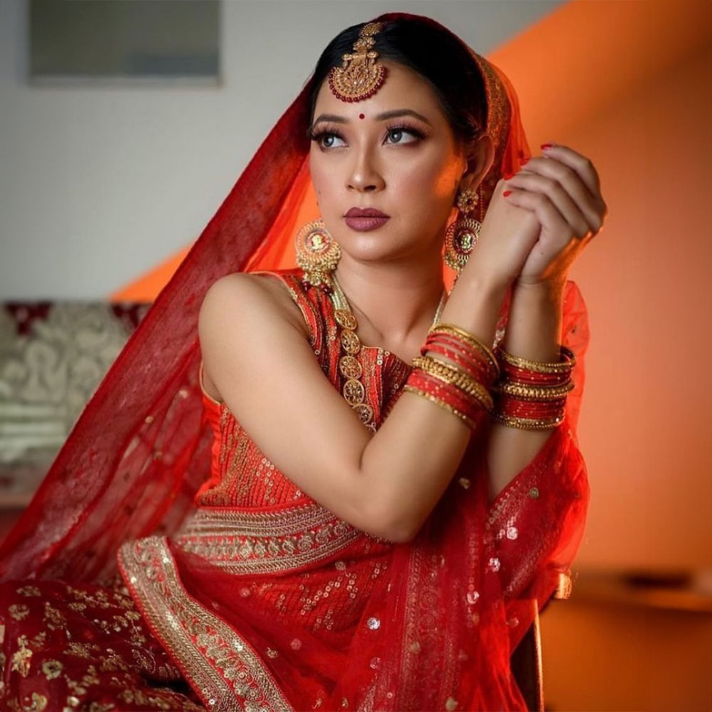 Skin,Lip,Hairstyle,Facial expression,Sari,Flash photography,Temple,Makeover,Lipstick,Eyelash