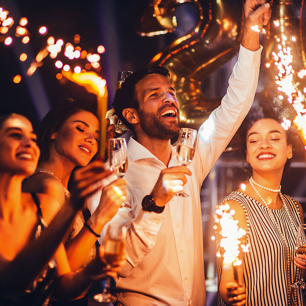 Smile,Hand,Facial expression,Muscle,Celebrating,Entertainment,Orange,Happy,Lighting,Gesture