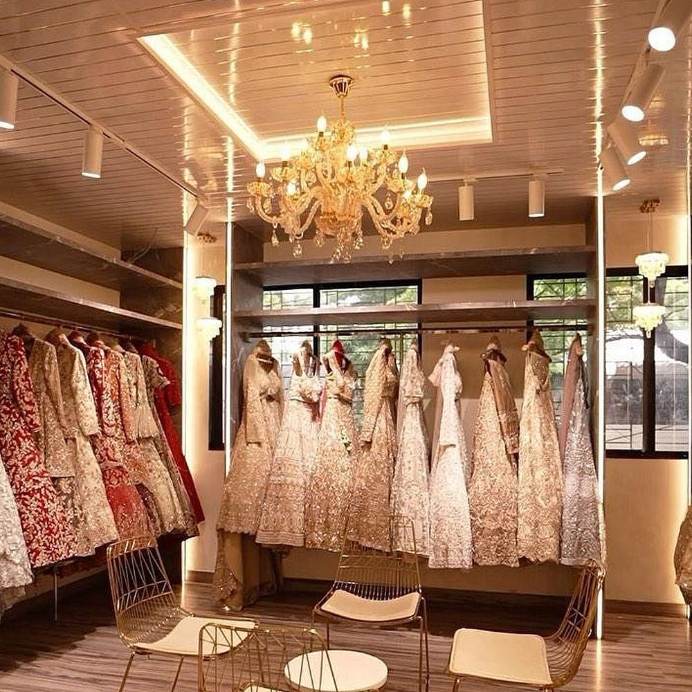 Decoration,Textile,Lighting,Interior design,Flooring,Floor,Ceiling,Retail,Event,Fashion design