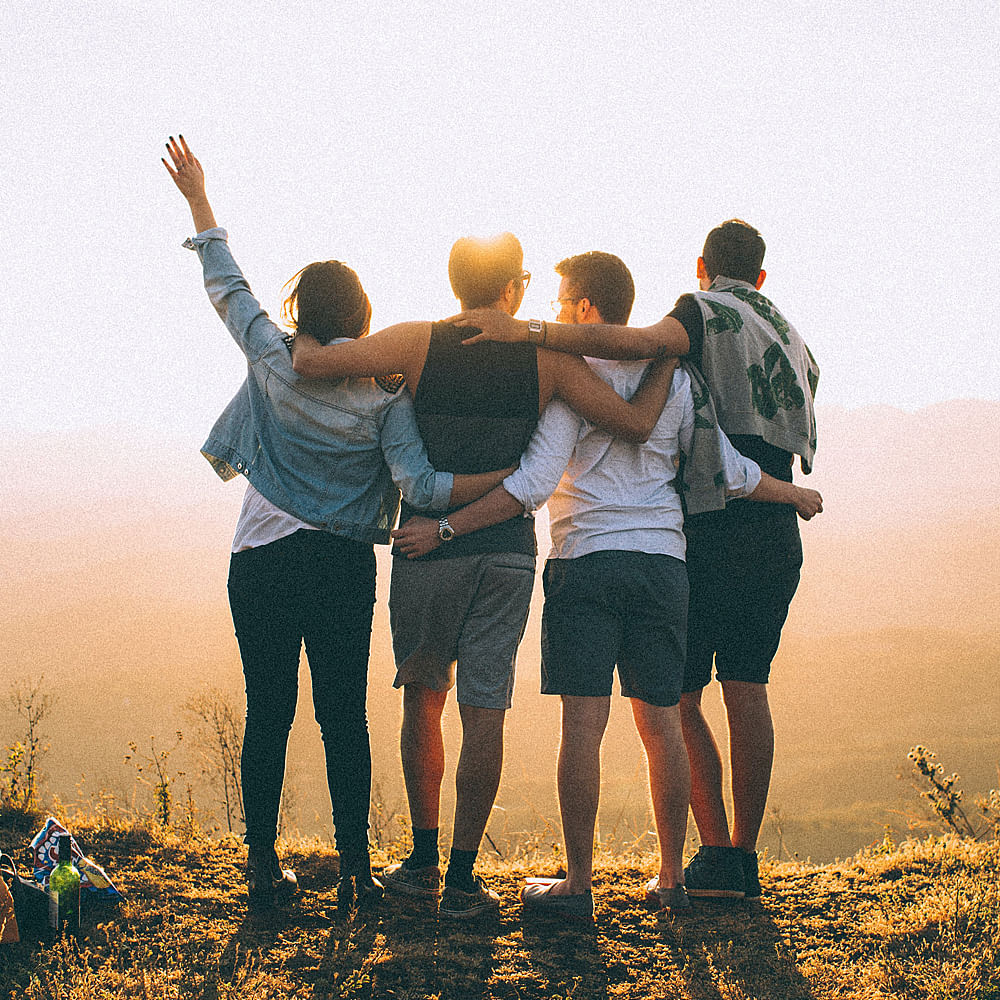 Shorts,Sky,Ecoregion,People in nature,Nature,Flash photography,Happy,Gesture,Sunlight,Travel