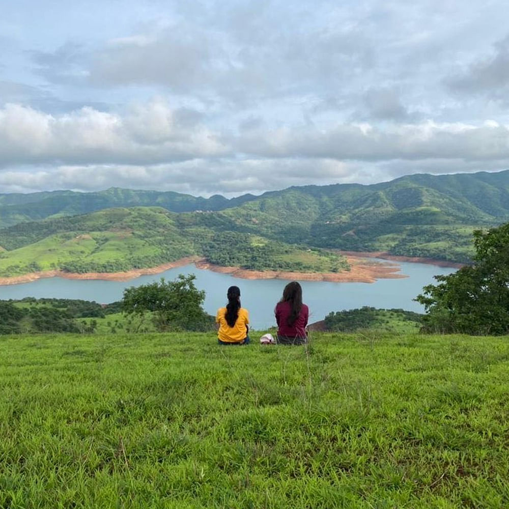 Water,Cloud,Sky,Mountain,Plant,Ecoregion,People in nature,Natural landscape,Lake,Vegetation