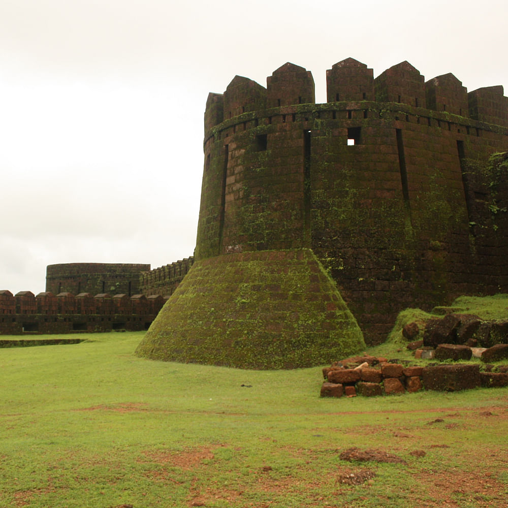 Sky,Building,Natural landscape,Highland,Grass,Landscape,Grass family,Grassland,Archaeological site,Ancient history