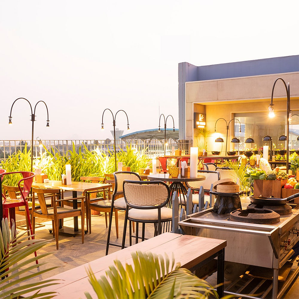 Table,Property,Plant,Furniture,Sky,Flowerpot,Chair,Interior design,Building,Shade