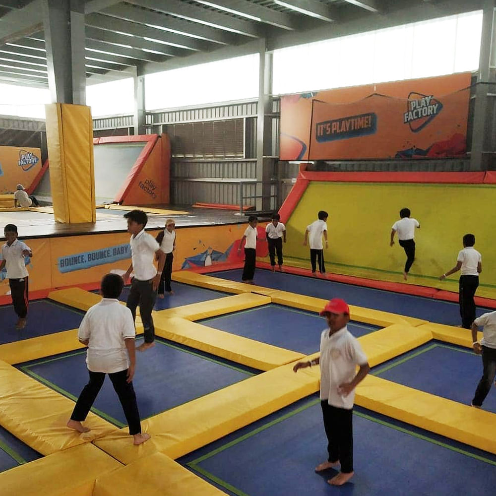 Orange,Yellow,Flooring,Floor,Sports,Competition event,Leisure,Field house,Wood,Balance