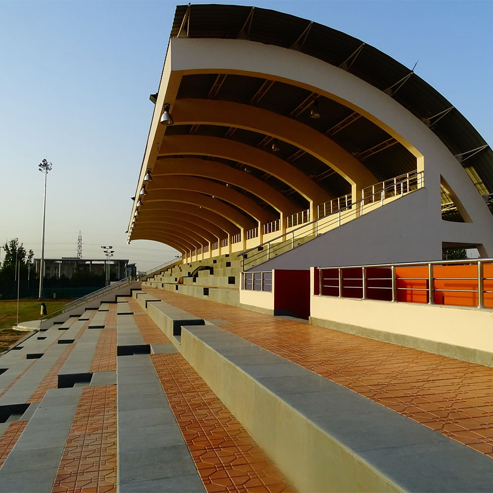 Sky,Architecture,Shade,Urban design,Asphalt,Road surface,Composite material,Road,Bridge,Street light