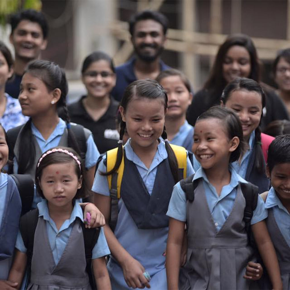 Smile,School uniform,Photograph,Facial expression,Black,Happy,Crowd,Snapshot,Event,Uniform