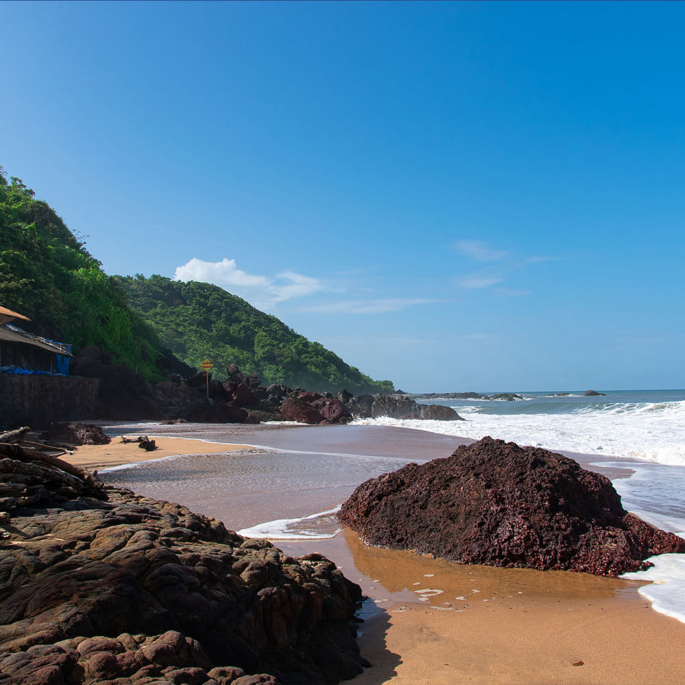 Water,Sky,Cloud,Water resources,Natural landscape,Beach,Mountain,Coastal and oceanic landforms,Watercourse,Bank