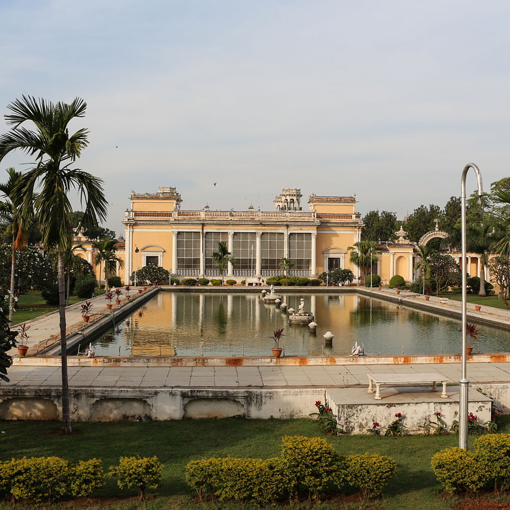 Water,Plant,Sky,Tree,Building,Body of water,Bank,Fountain,Landscape,Leisure