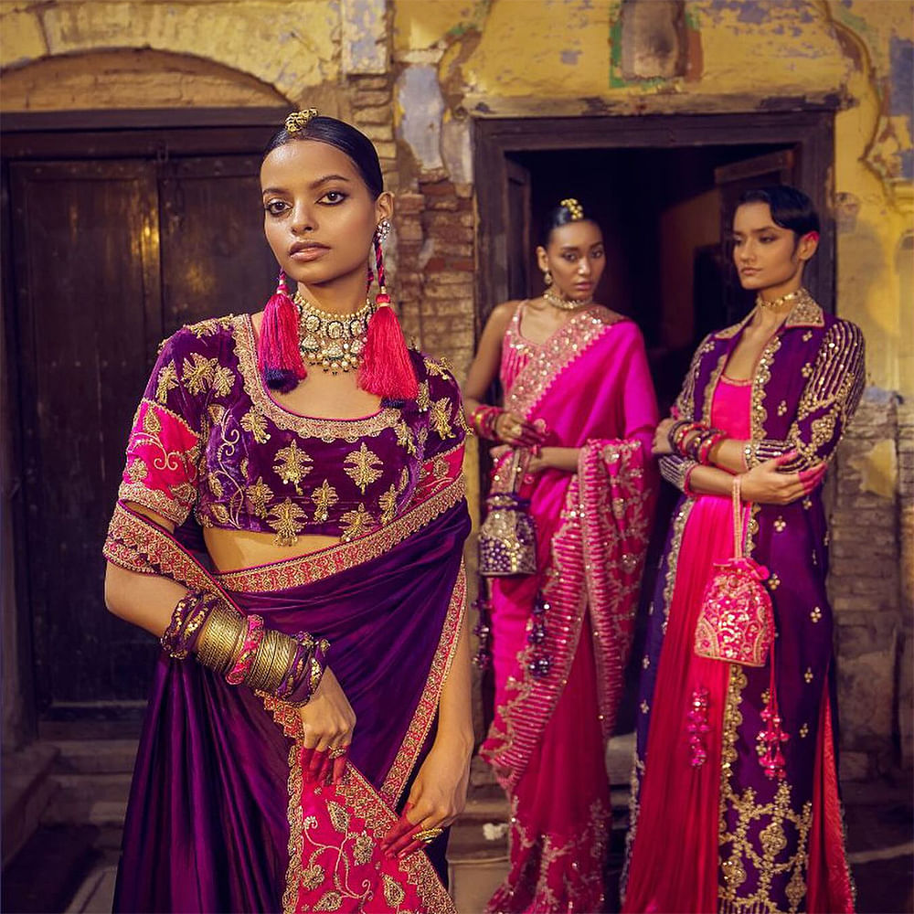 Hand,Sari,Purple,Decoration,Temple,Textile,Sleeve,Pink,Fashion design,Magenta