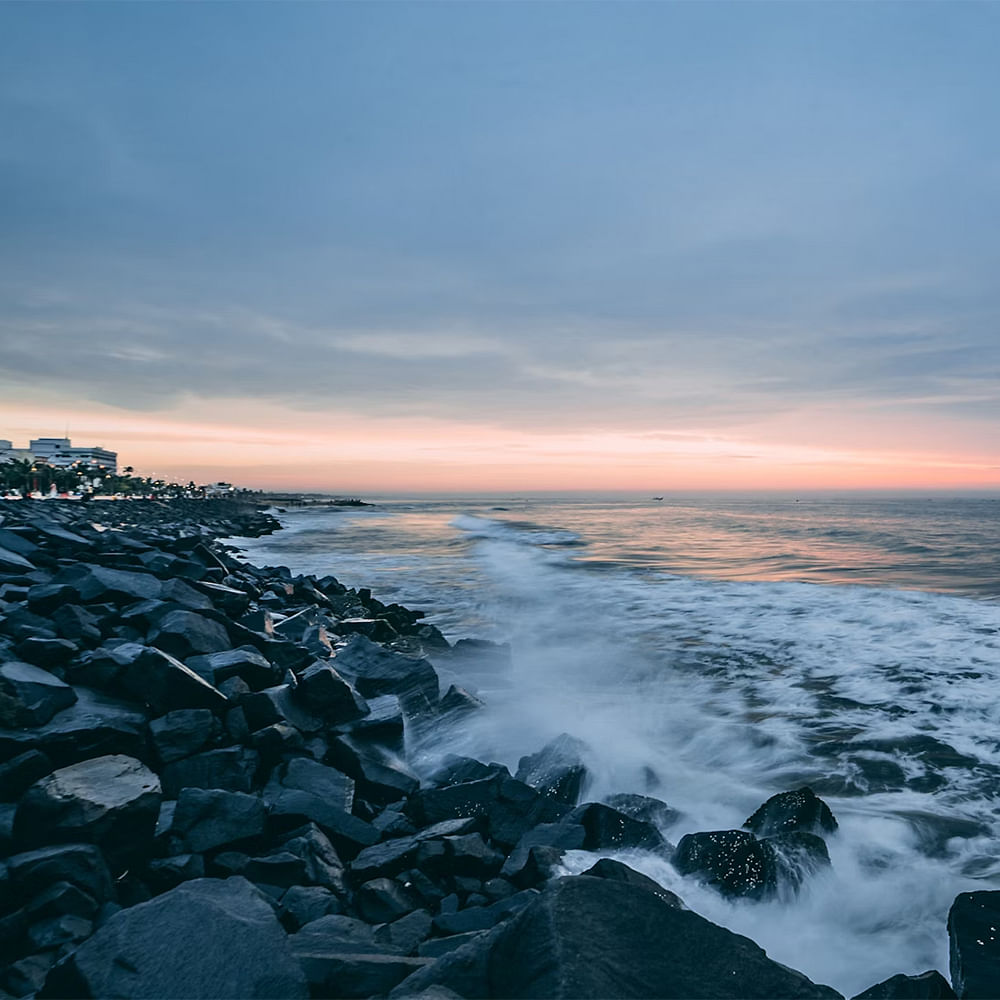 Cloud,Water,Sky,Natural landscape,Coastal and oceanic landforms,Dusk,Landscape,Horizon,Wind wave,Sunrise