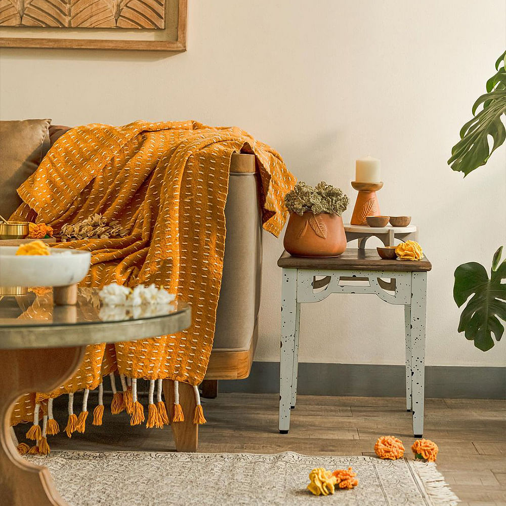 Table,Furniture,Plant,Orange,Textile,Interior design,Yellow,Comfort,Floor,Lamp