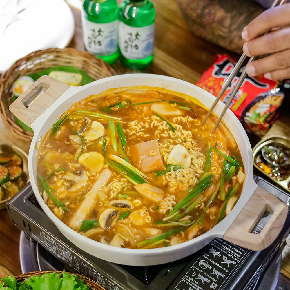 Food,Soup,Stew,Noodle soup,Curry,Cookware and bakeware,Recipe,Budae jjigae,Noodle,Cooking