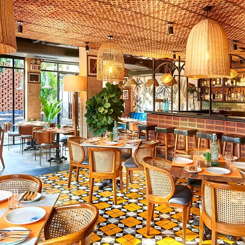 Furniture,Chair,Restaurant,Natural material,Design,Outdoor Table,Outdoor furniture,Kitchen & Dining Room Table,Wicker