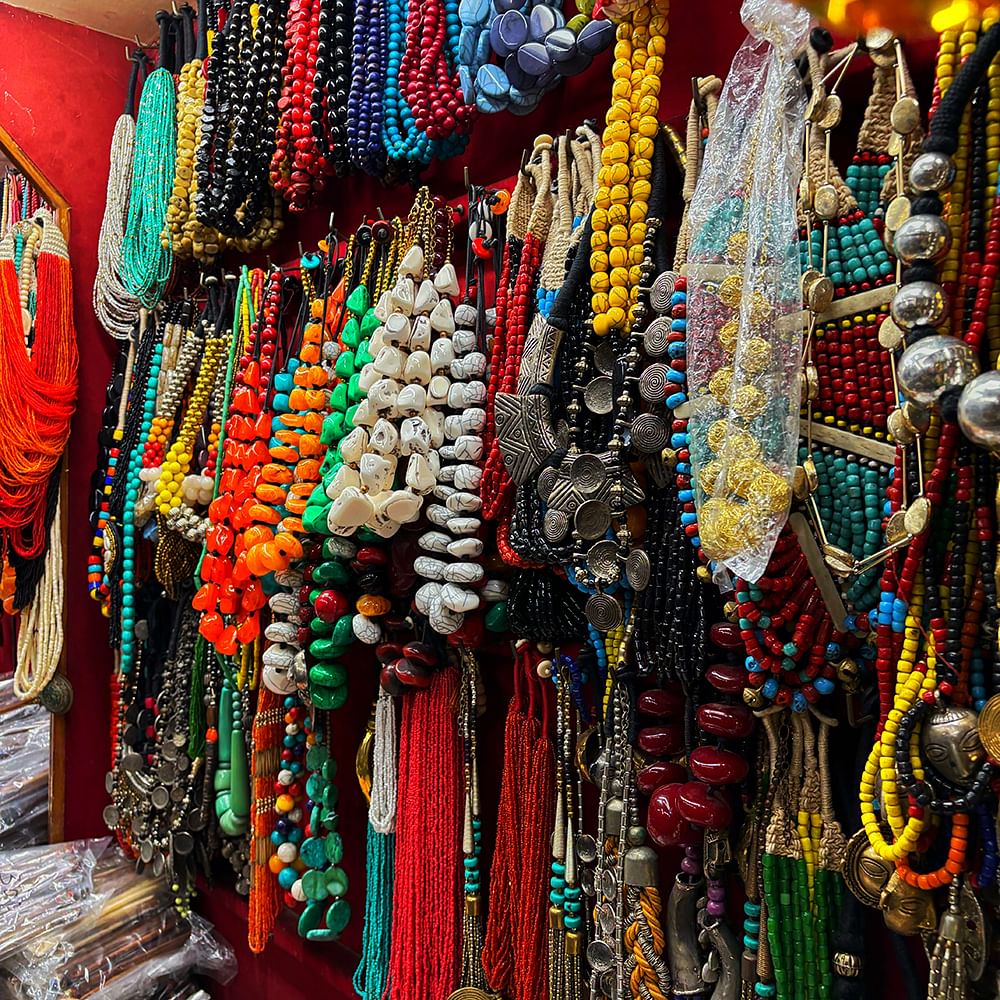 Jewellery,Bead,Market,Bazaar,Necklace,Craft,Natural material,Flea market,Creative arts,Retail