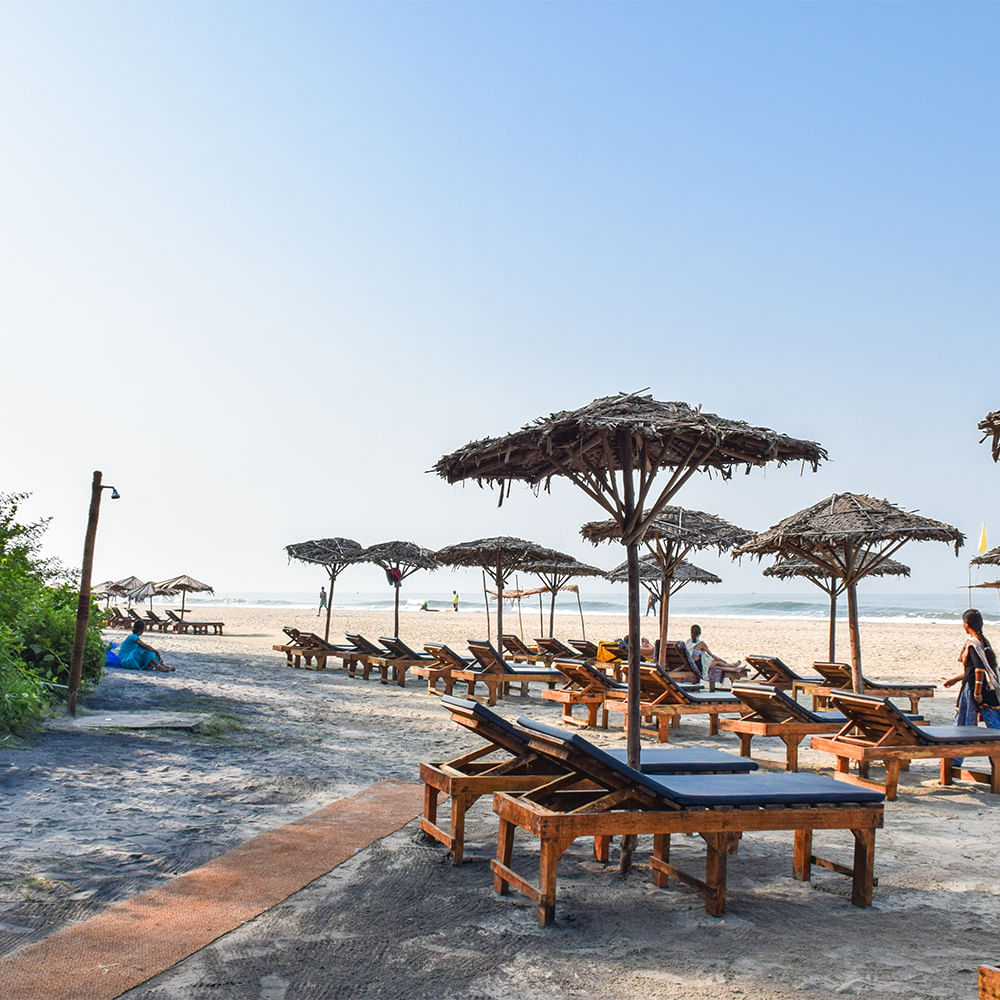 Shade,Outdoor furniture,Beach,Umbrella,Vacation,Tropics,Sunlounger,Thatching,Resort,Sand