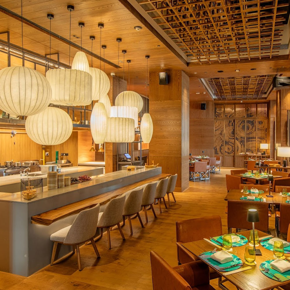 Interior design,Flooring,Wood,Light fixture,Ceiling,Furniture,Lighting,Floor,Chandelier,Restaurant