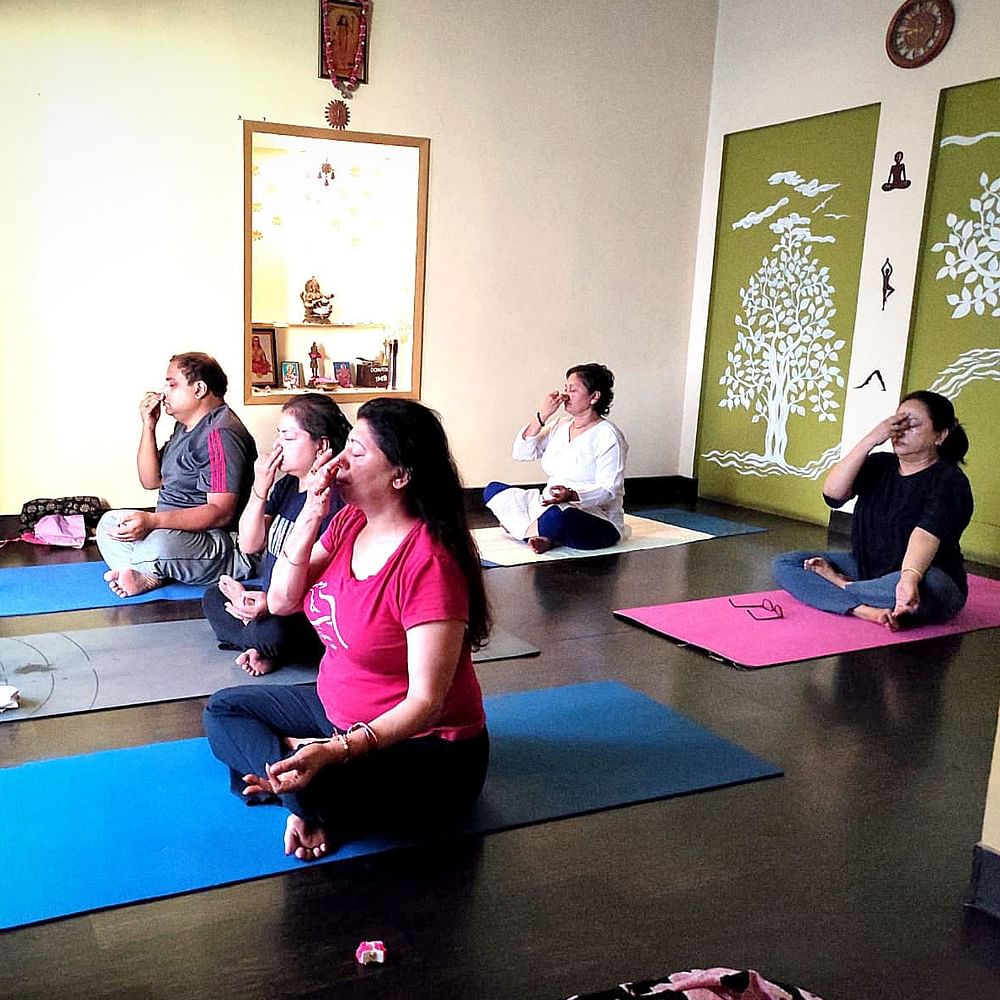 Physical fitness,Yoga,Exercise,Yoga mat,Flooring,Mat,Sleeping pad,Training,Yoga pants,Balance