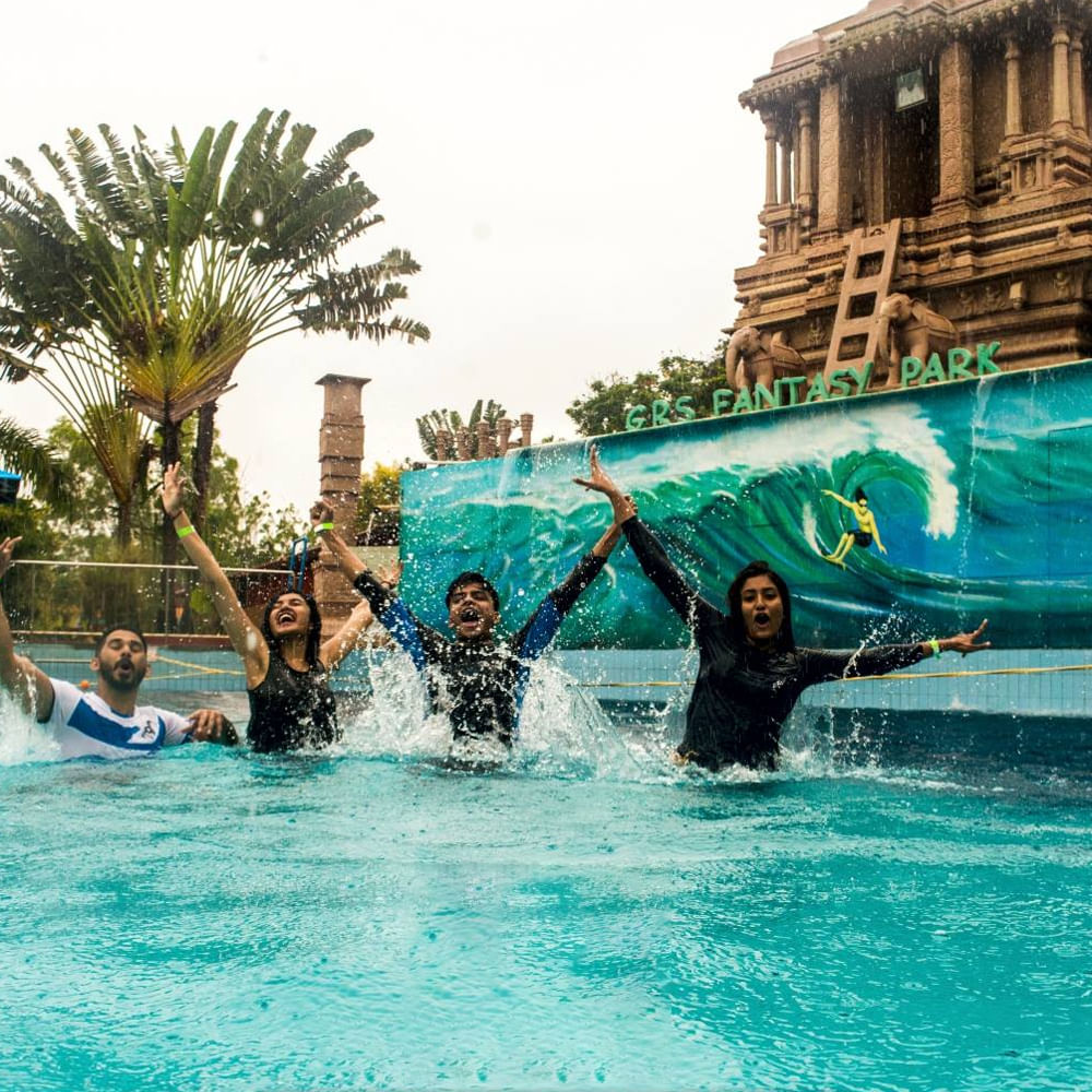 Recreation,Leisure,Swimming pool,Fun,Vacation,Tourist attraction,Holiday,Travel,Resort,Palm trees