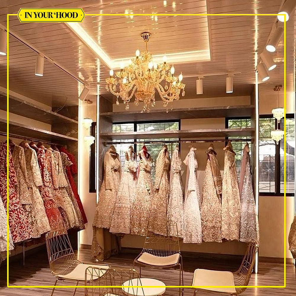 Flooring,Fashion,Interior design,Boutique,Dress,Floor,One-piece garment,Retail,Ceiling,Day Dress