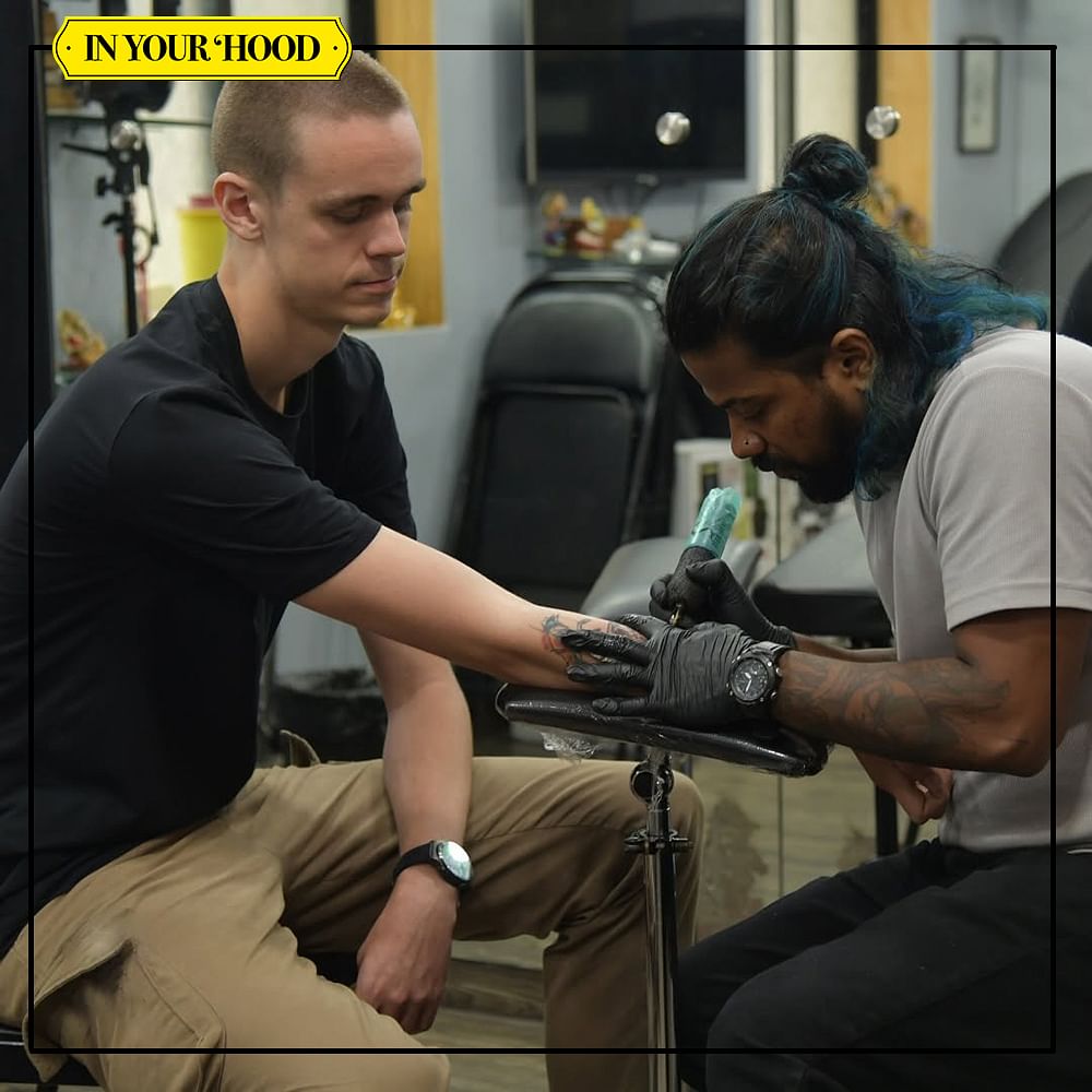 Arm,Hand,Wrist,Watch,Elbow,Tattoo,Beard,Tattoo artist,Barber,Temporary tattoo