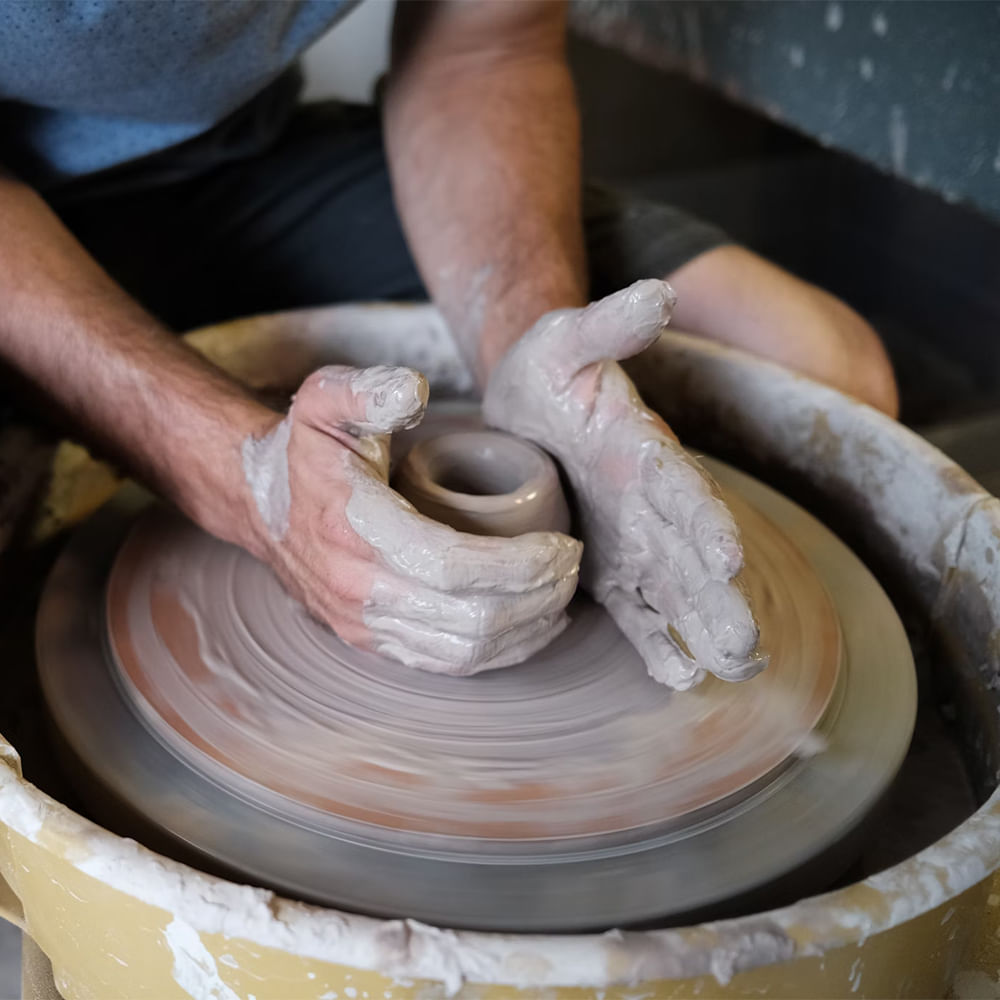 Potter's wheel,Artisan,Clay,Pottery,Creative arts,Craft,Stoneware,Ceramic,Serveware,Porcelain