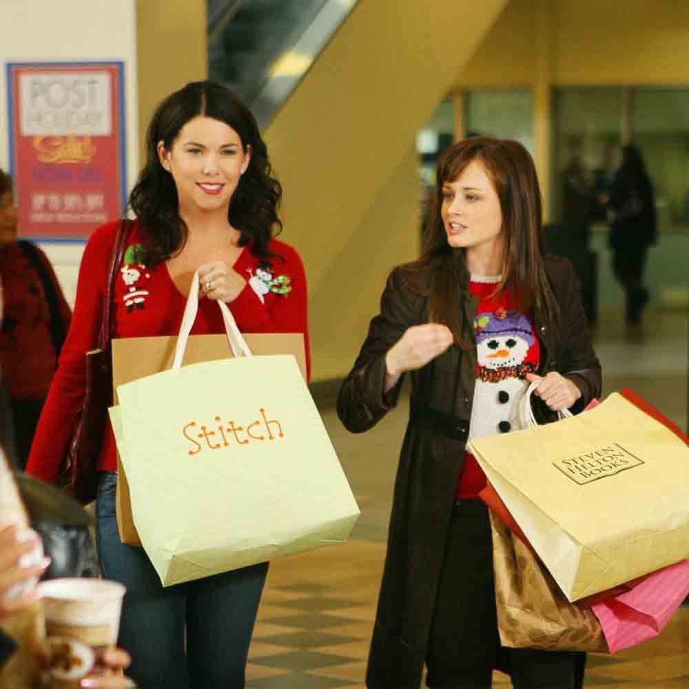 Smile,Facial expression,Happiness,Bag,Luggage & bags,Customer,Shopping bag,Shopping,Handbag,Holiday