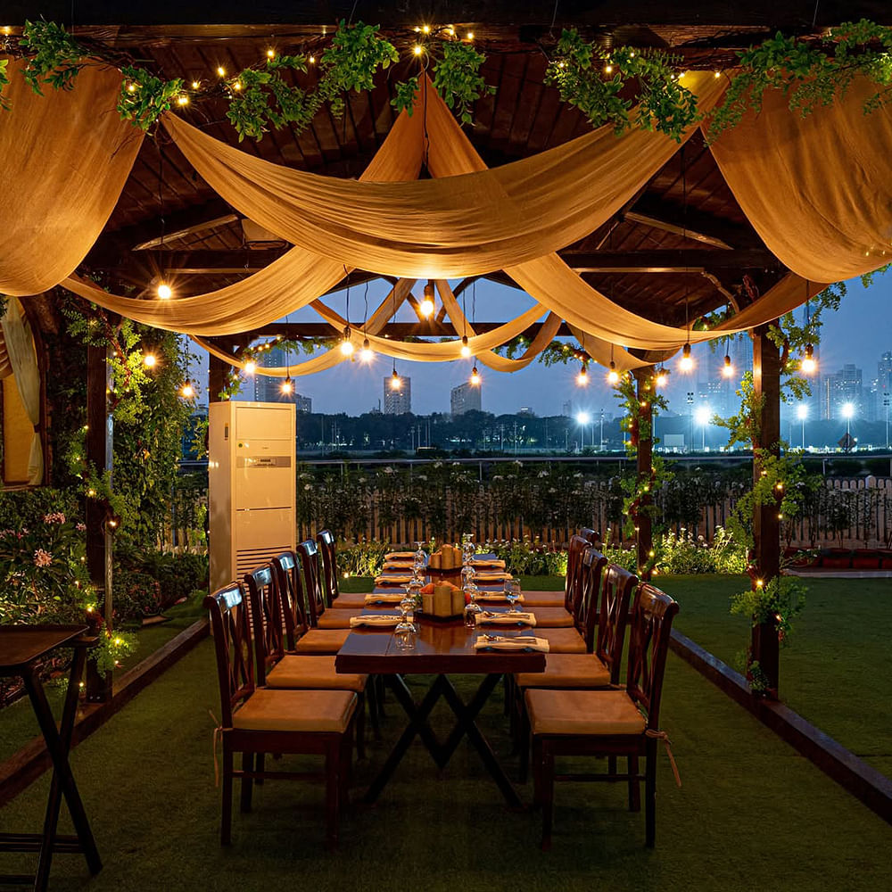 Furniture,Table,Chair,Restaurant,Decoration,Banquet,Rehearsal dinner,Eco hotel,Floral design,Houseplant