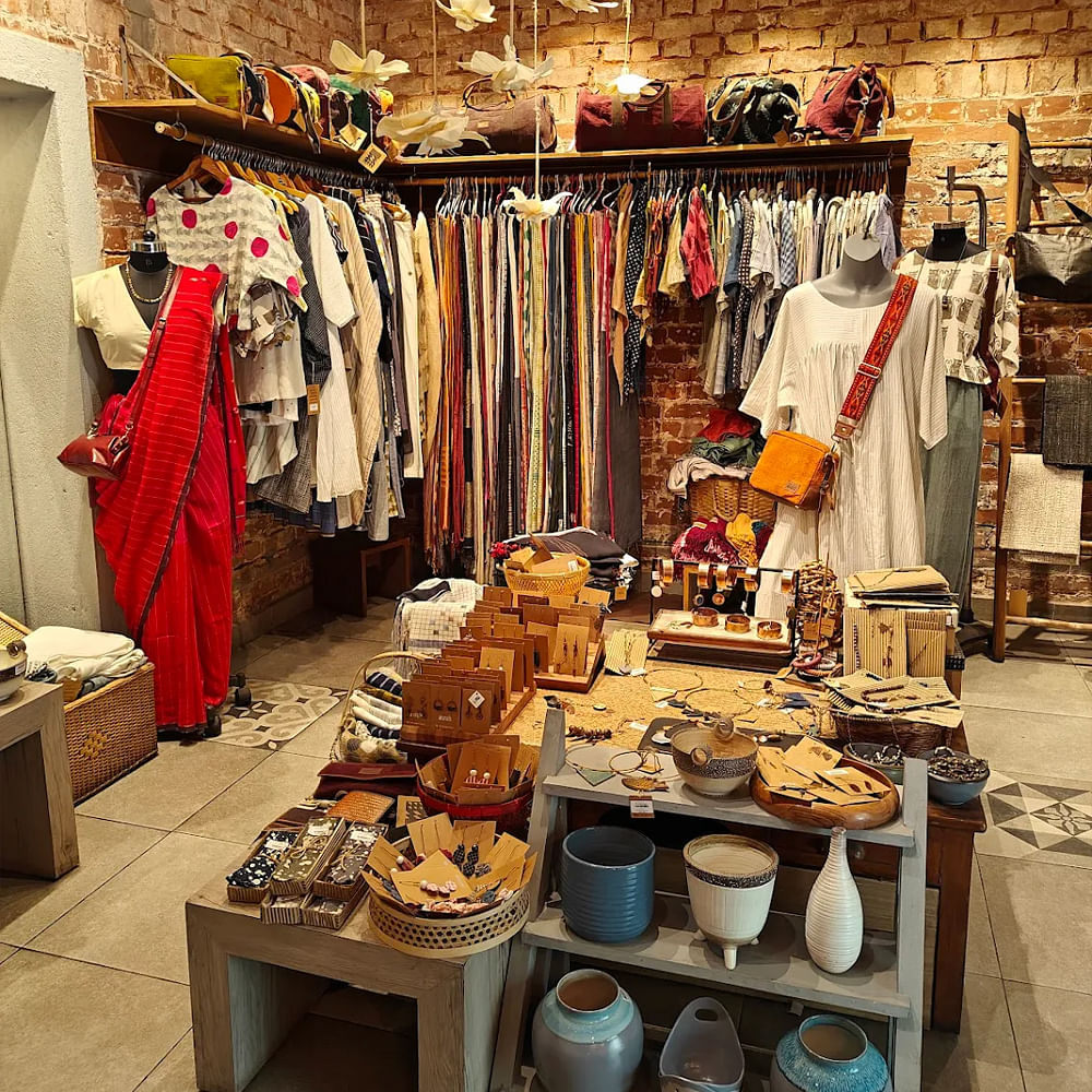 Retail,Fashion,Textile,Clothes hanger,Interior design,Boutique,Shelving,Shelf,Closet,Vintage clothing