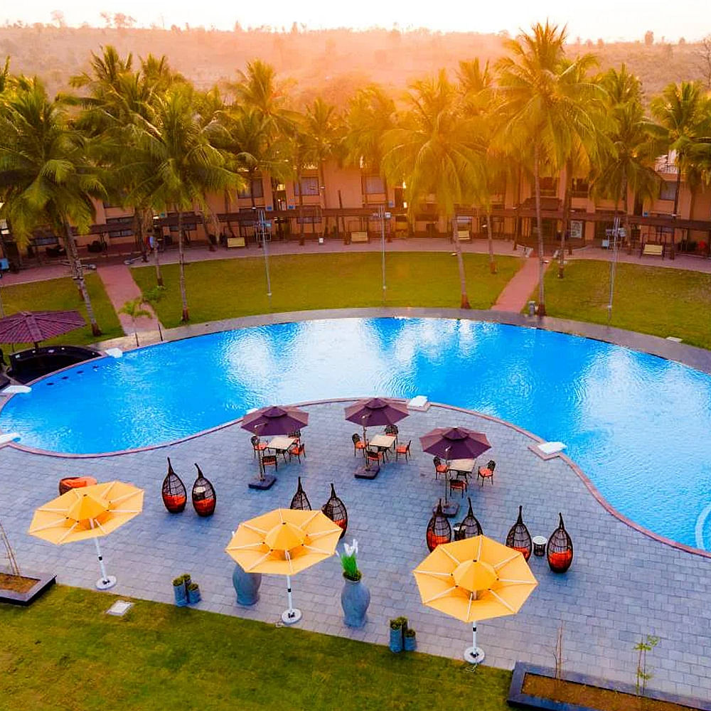 Swimming pool,Resort,Leisure,Palm trees,Hotel,Resort town,Eco hotel,Reflection,Night,Hacienda